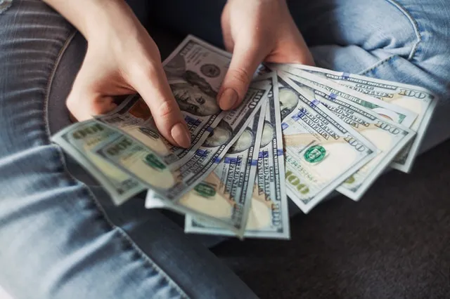 person-holding-money